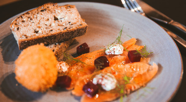 Fennel and green tea cured Tasmanian Salmon with pickled beets, crumbed egg, rye toast and sumac sour cream.