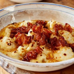 Warm up with hearty cauliflower cheese with crispy maple syrup pancetta