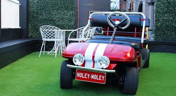 Get your par-tee on at bar-meets-mini-golf-course Holey Moley Golf Club