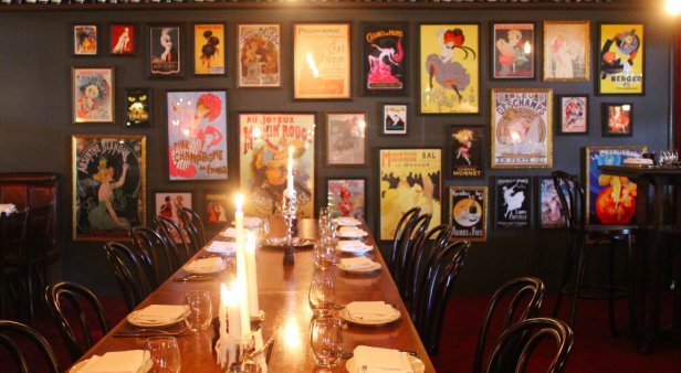 Sample souffle and steak frites at the stylish Parisian-inspired Madame Rouge Bar + Bistro