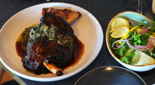 Lamb shoulder, with pea, zucchini, squash, red onion, mint and lemon dressing