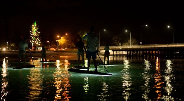 These glow-in-the-dark SUP tours are your next nighttime adventure